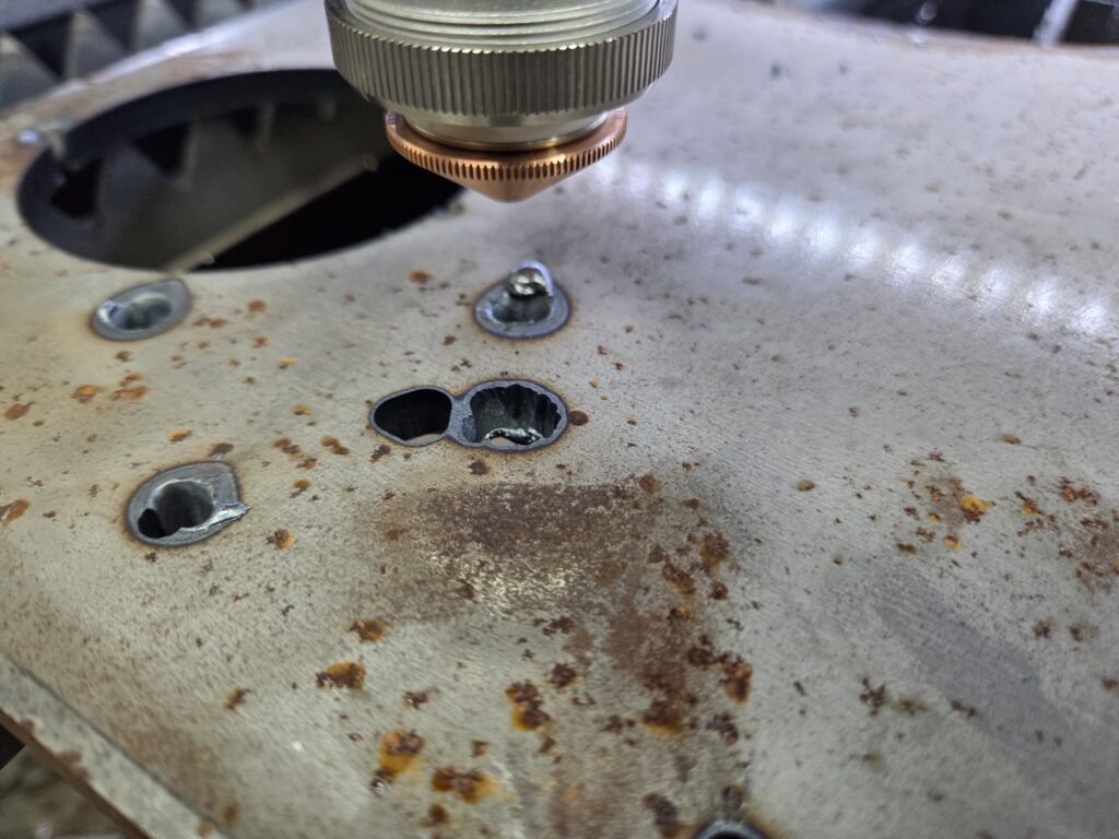 Fiber laser carbon steel burn through