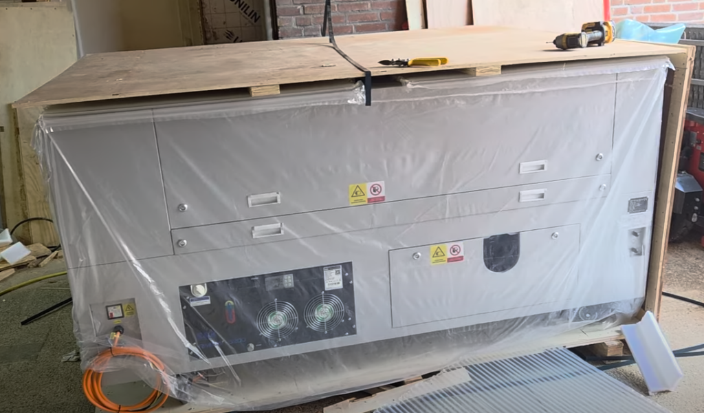Gweike M3 Ultra CNC cutting unit arriving wrapped and crated on a pallet
